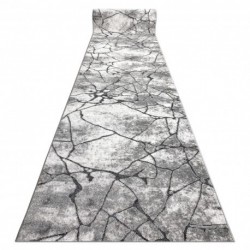 Šiuolaikinis kilimas JAUKNUS 8873 su įtrūkusiu betonu, struktūriniu dviejų sluoksnių vilnu ir tamsia pilka spalva